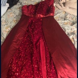 Red sequin dress with an attached silk skirt.